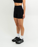 Side angle showcasing high-rise waistband and sculpted fit