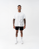 Full-length front view of a man in the black Nexletica Perform Hybrid Oversized T-Shirt with matching shorts, socks and trainers