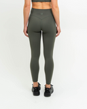 Back view of Synergy Leggings with rear logo and sculpted fit